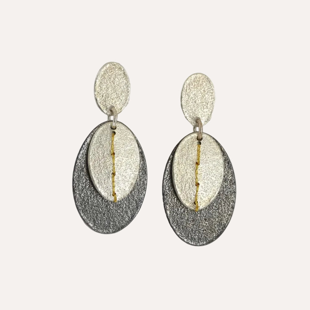 Sewn up dangly double earrings - oxi/gold thread