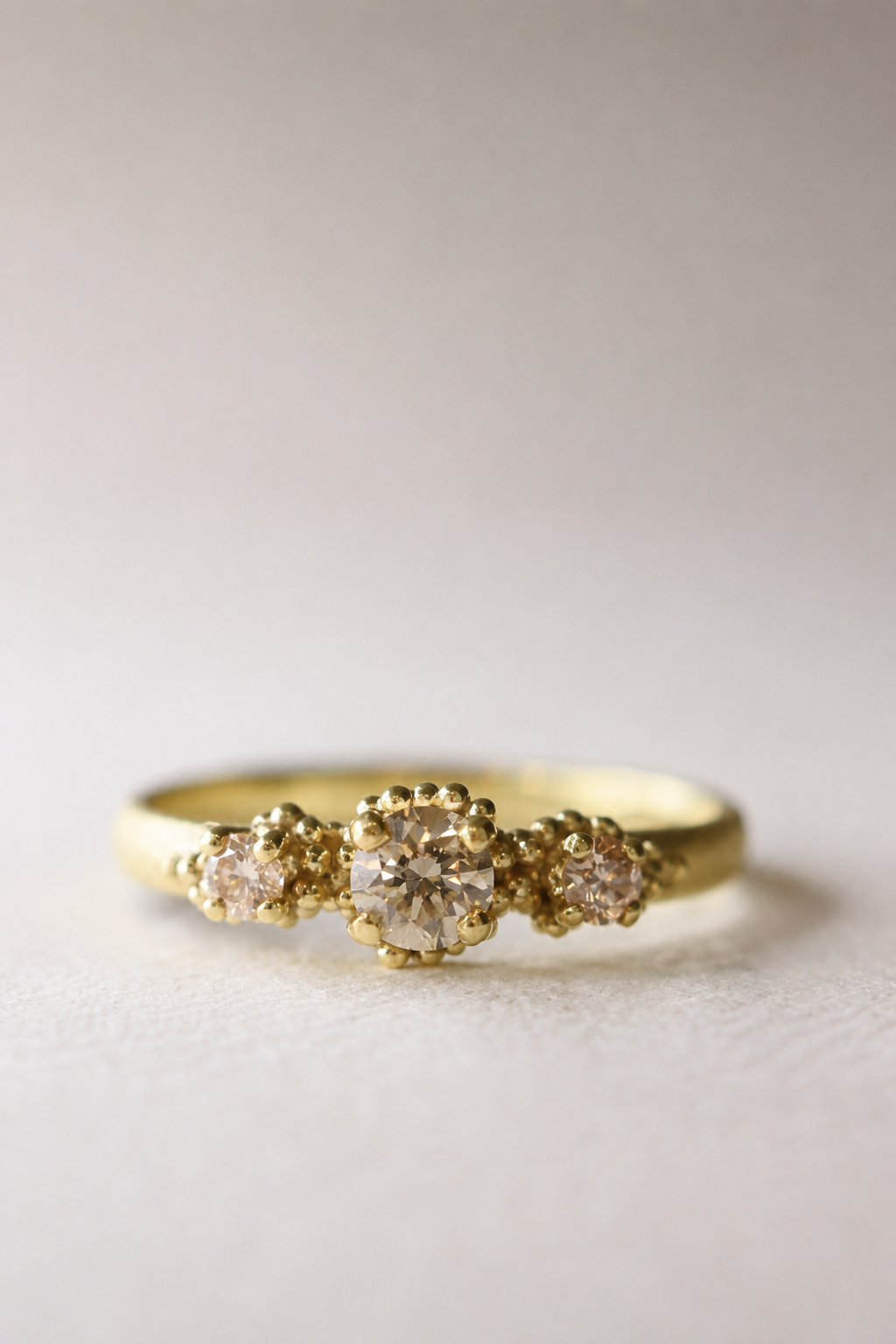 Triple Cluster Ring with Champagne Diamonds