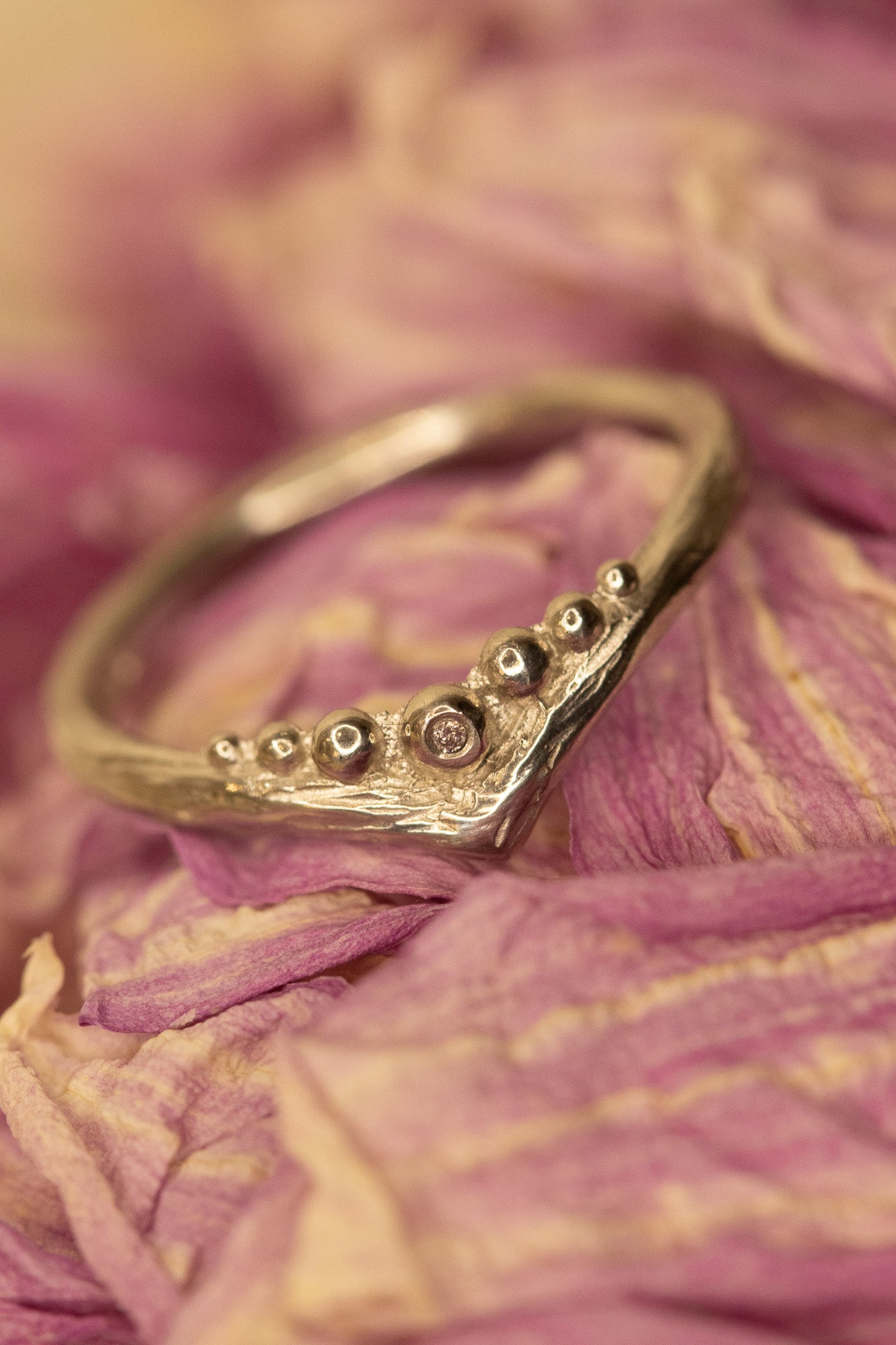 Urchin ring with tiny pink diamond platinum