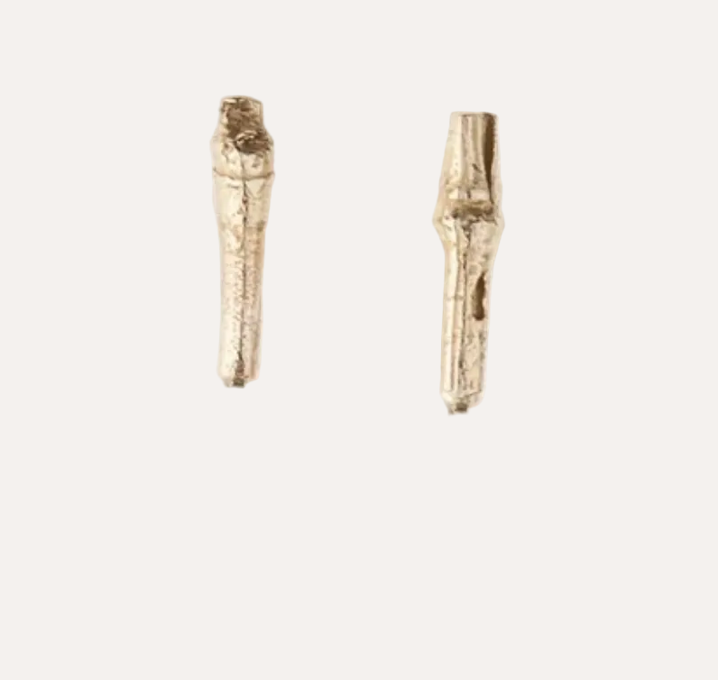 A pair of small gold-toned stud earrings with a textured, organic, branch-like shape, shown on a plain white background.