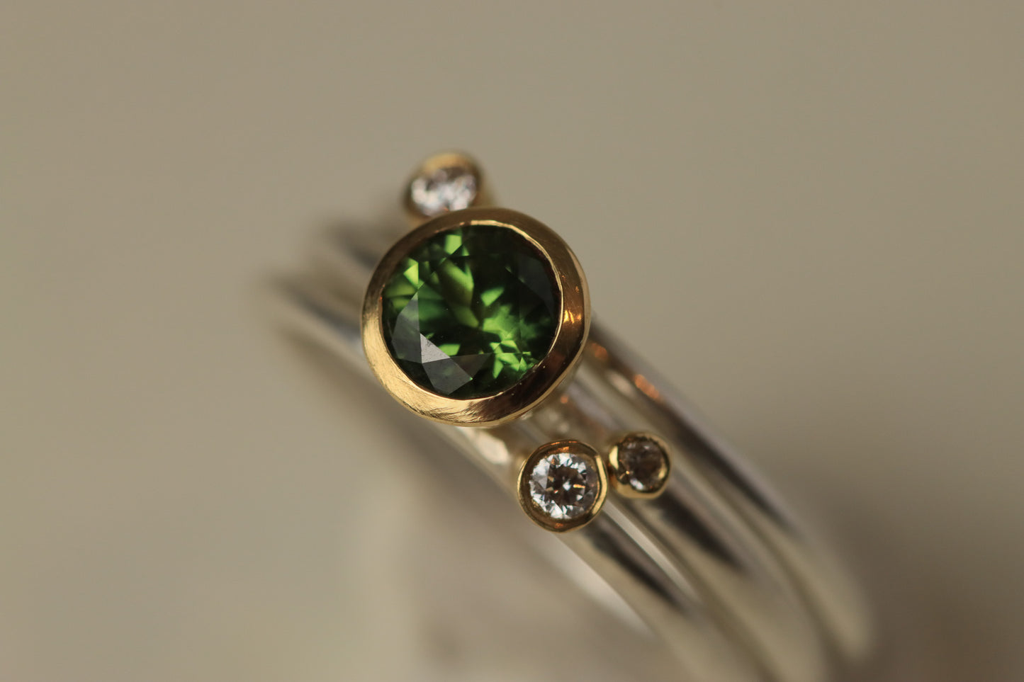Stacking rings with diamonds and Green Sapphire