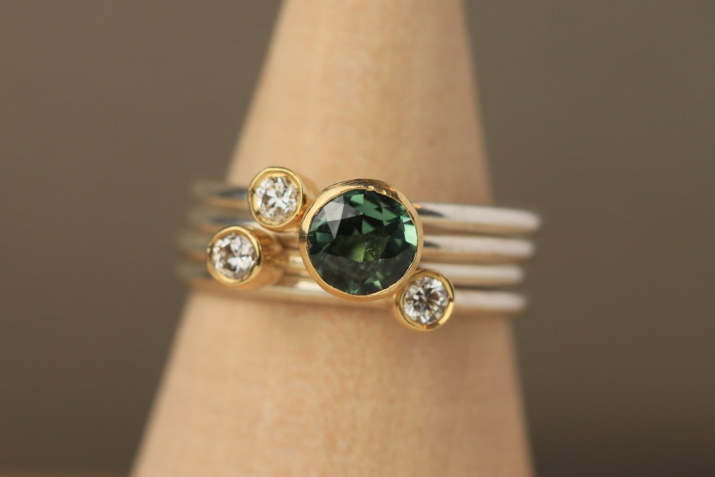 Stacking rings with diamonds and Teal Sapphire