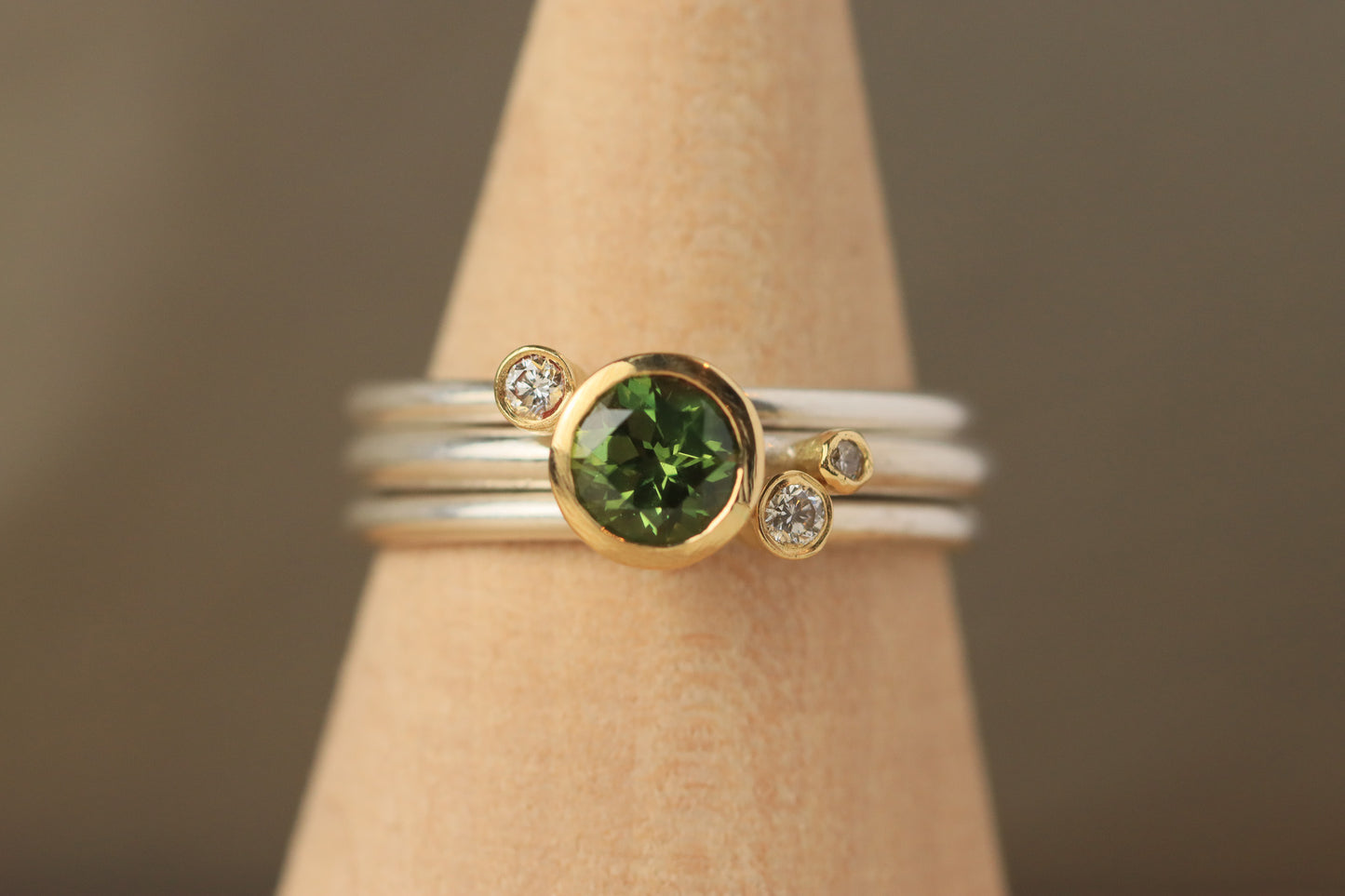 Stacking rings with diamonds and Green Sapphire