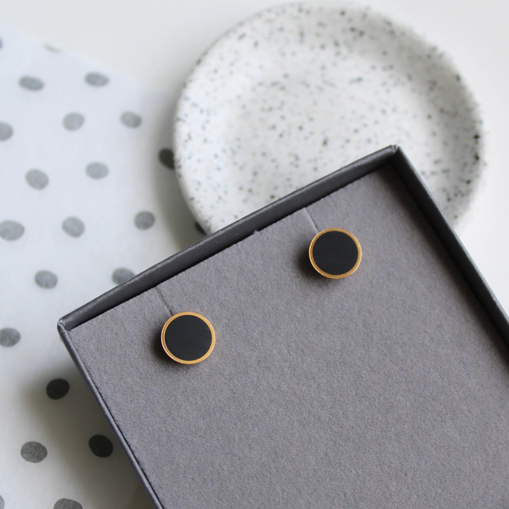 black and gold stud earrings