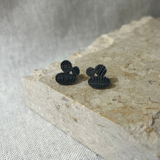 black stud earrings