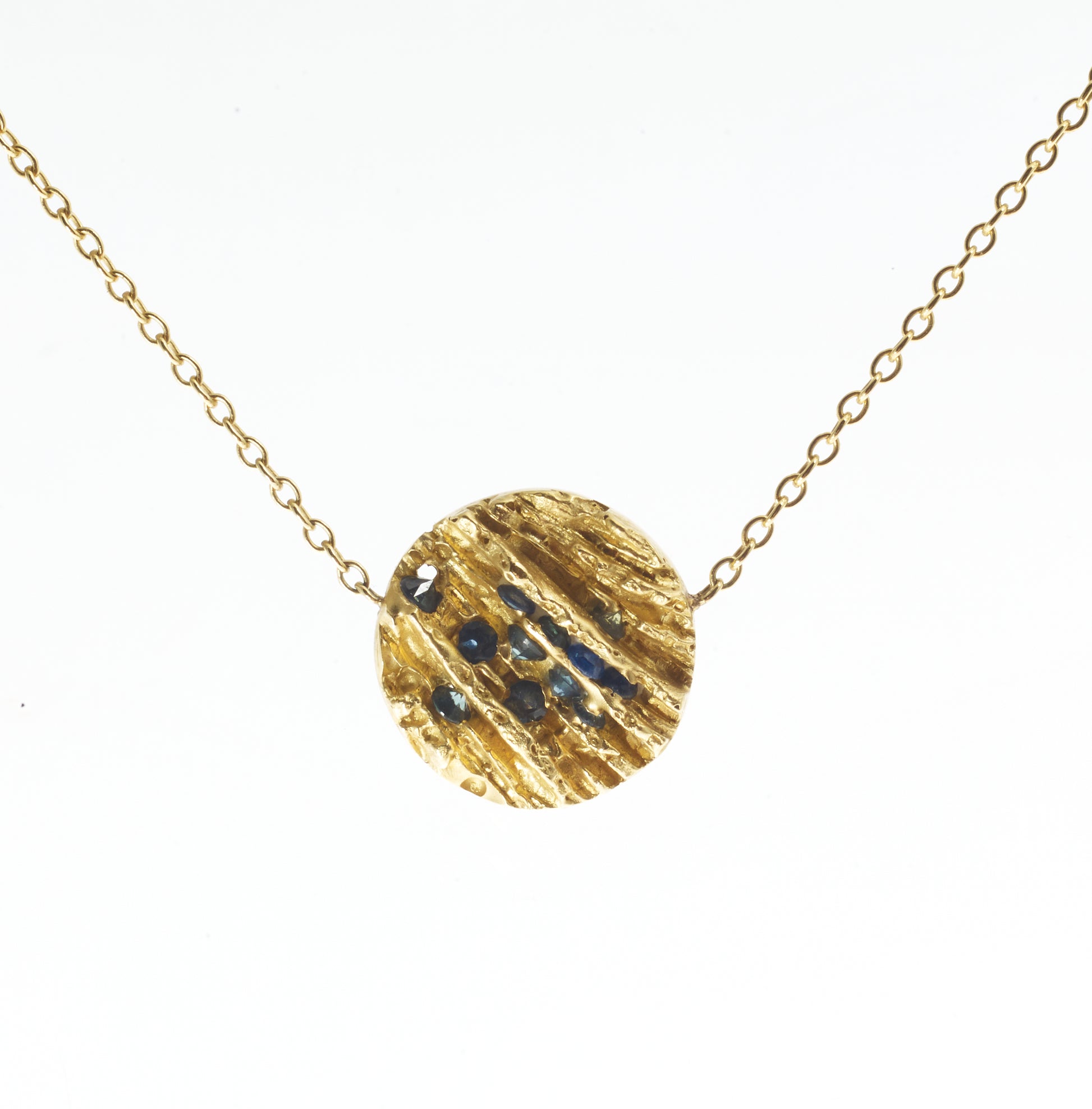 blue and gold pendant