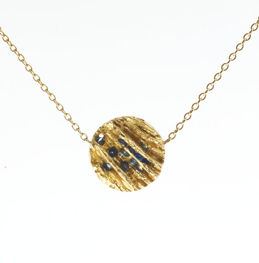 blue and gold pendant