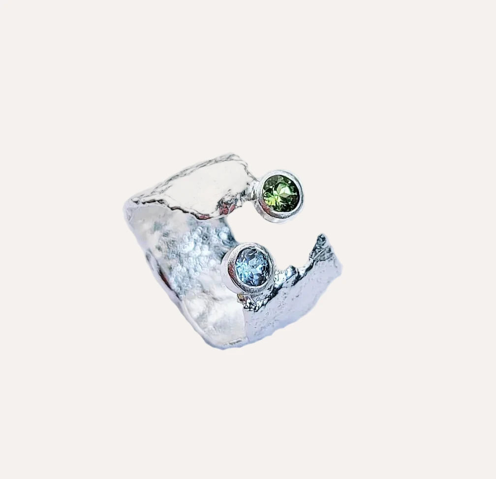 Silver, blue topaz and peridot ring
