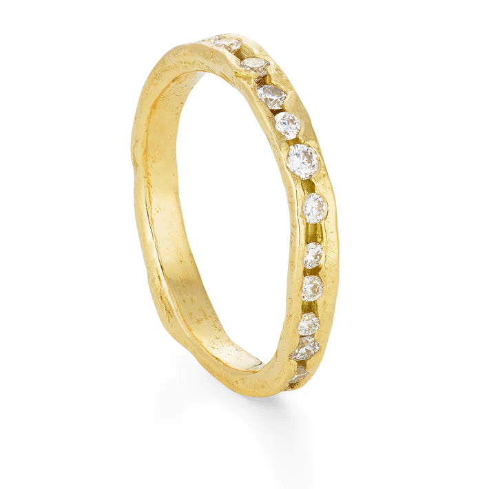 channel set gold eternity ring