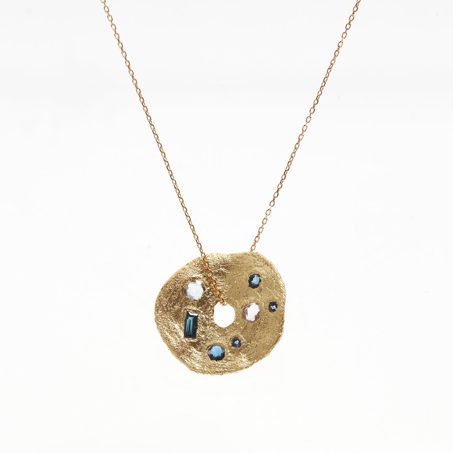 circle gold pendant sapphires
