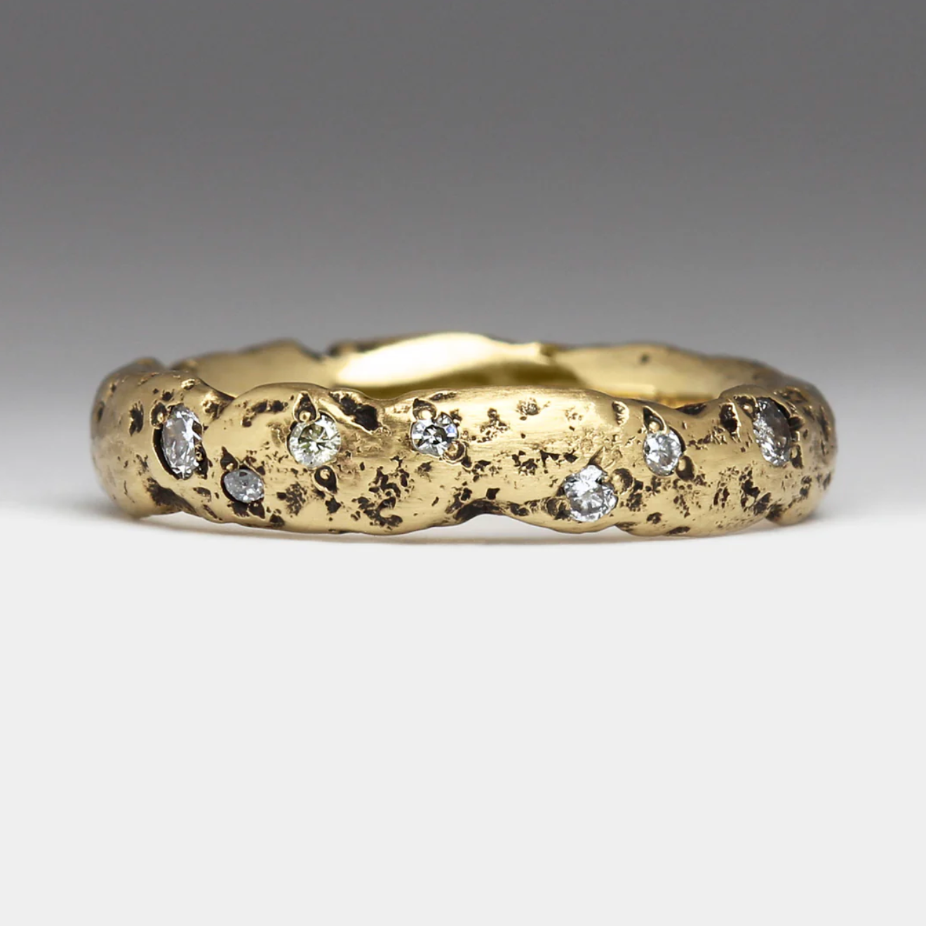 extra textured gold and diamond sandcast ring