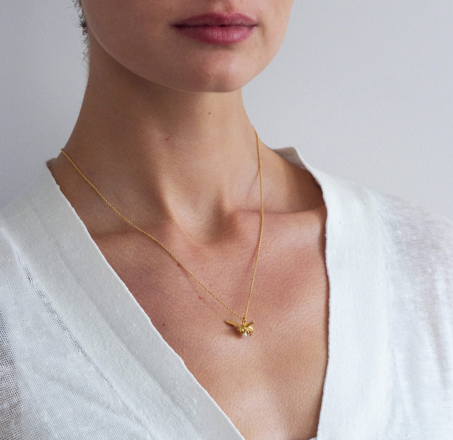 Flying Bee with Pearl Necklace