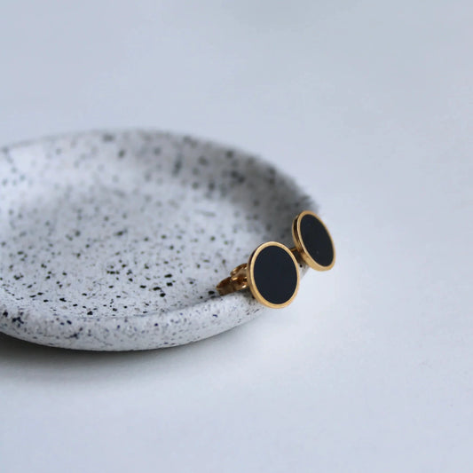 gold and black arc studs