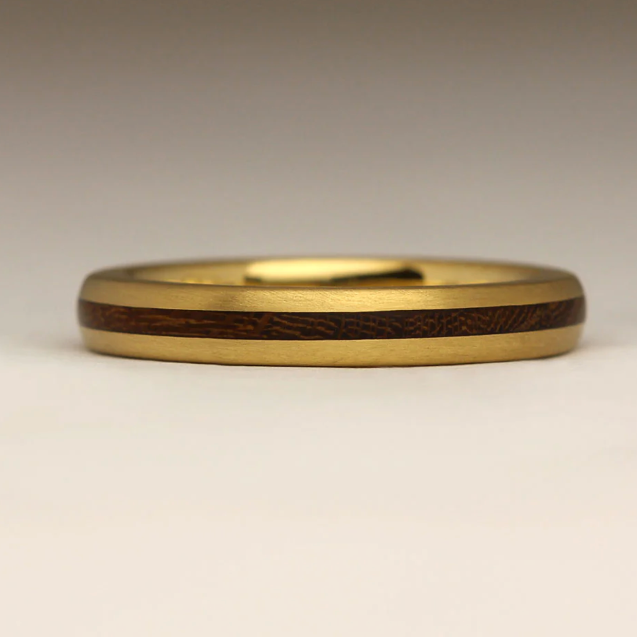gold and wood ring