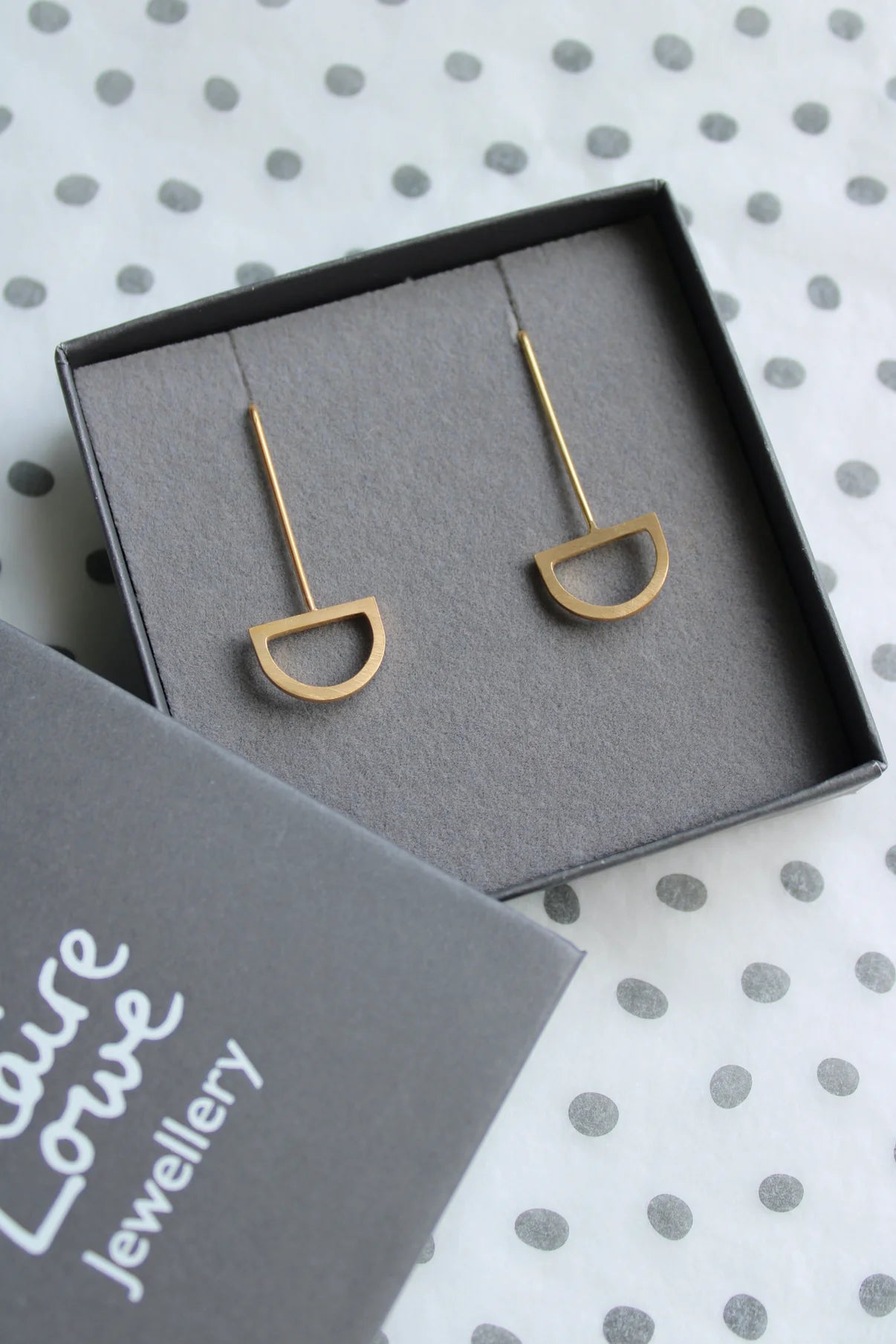 gold arc drop earrings