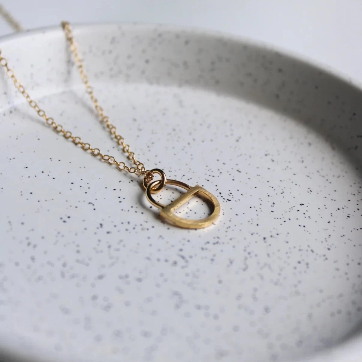 gold double arc pendant
