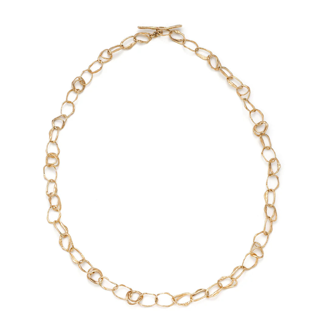 gold pebble drawing necklace