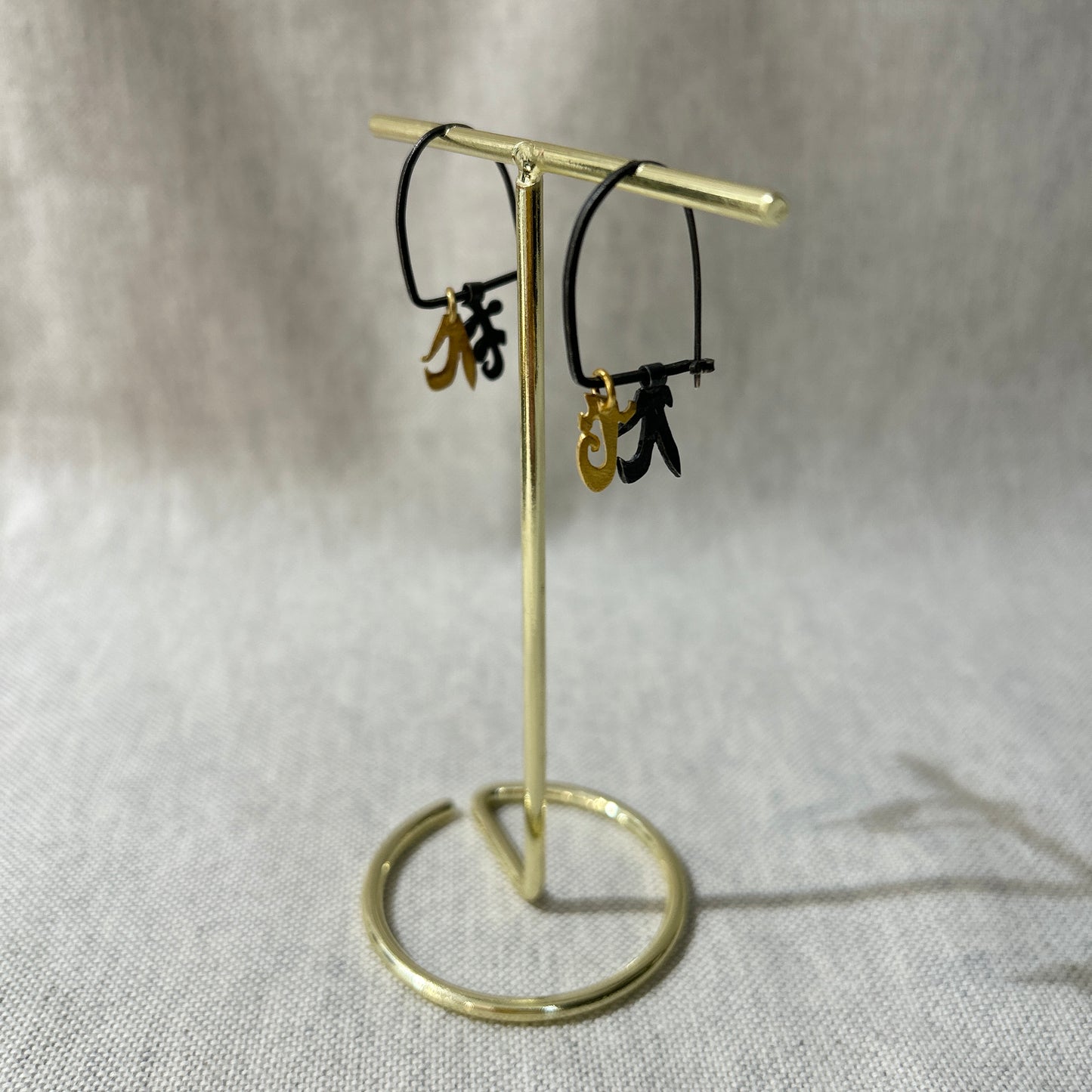 seedling earrings on earring stand