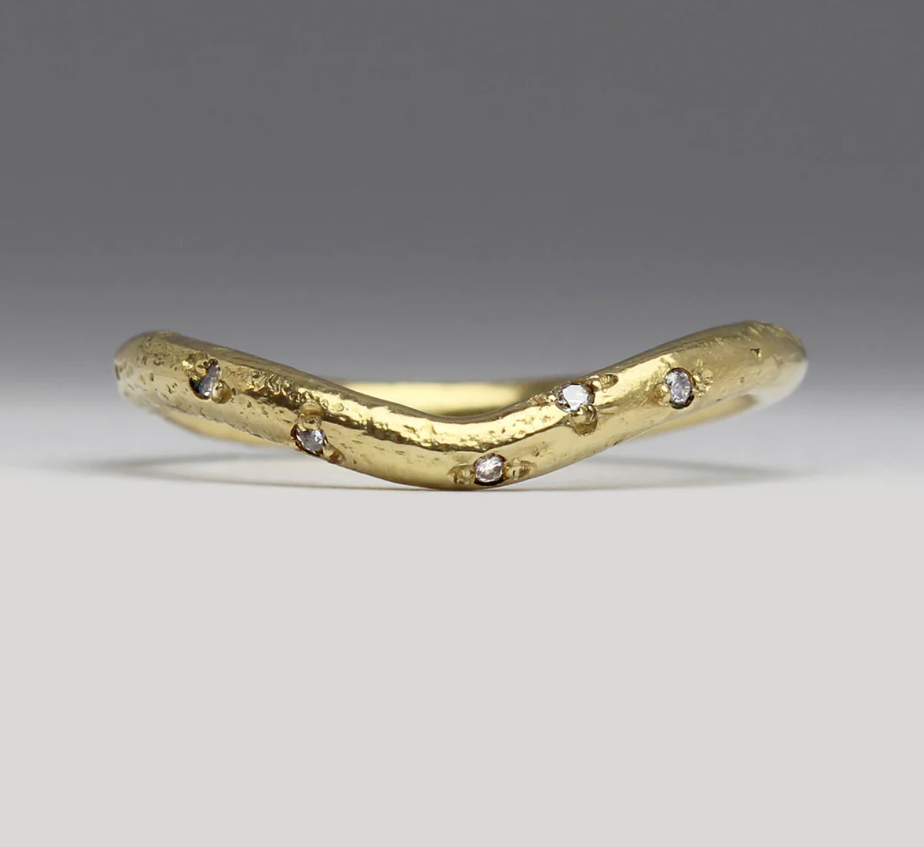 shaped gold and diamond wedding ring