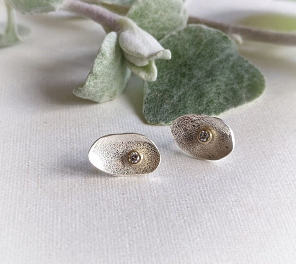 silver petal stud earrings