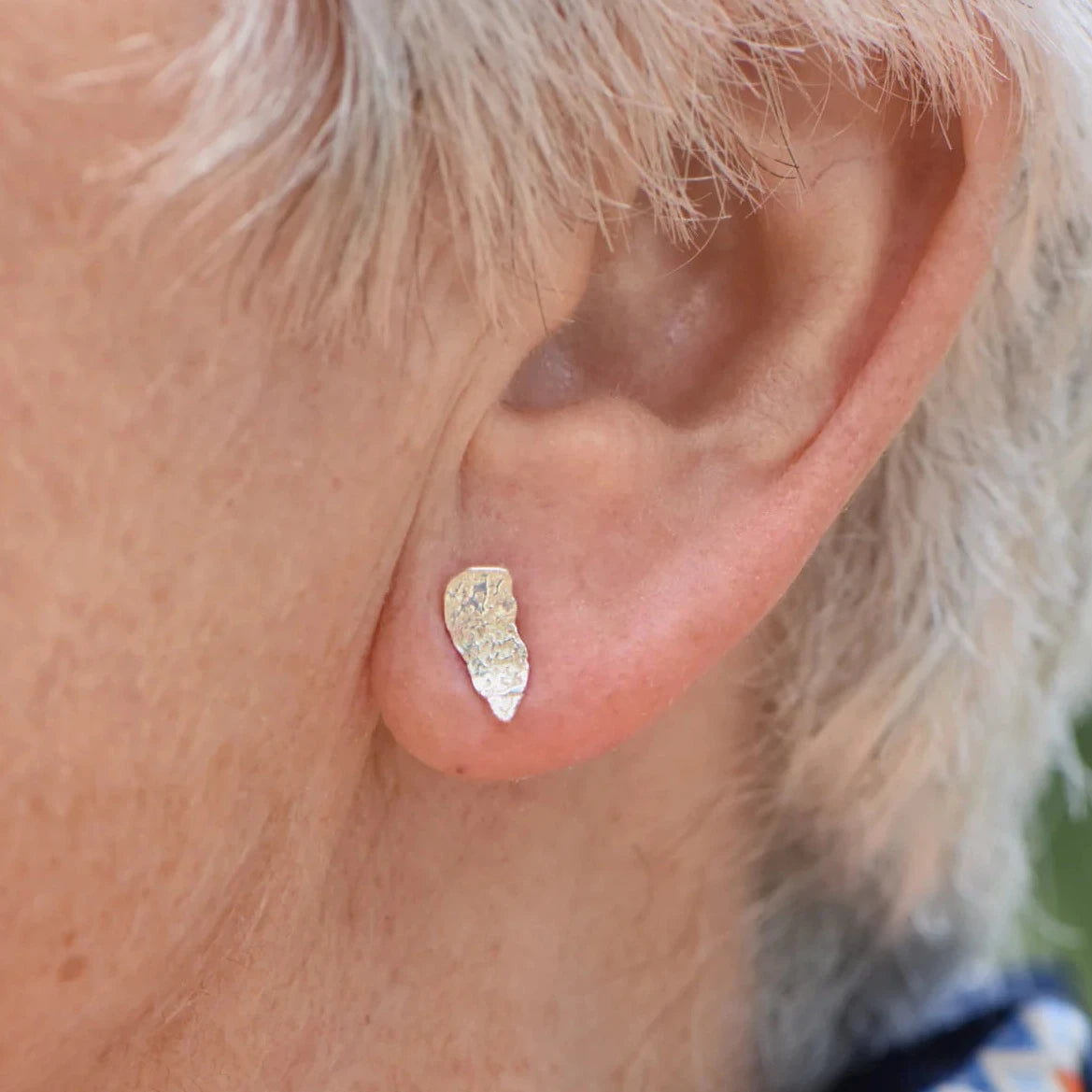 silver wisp studs worn