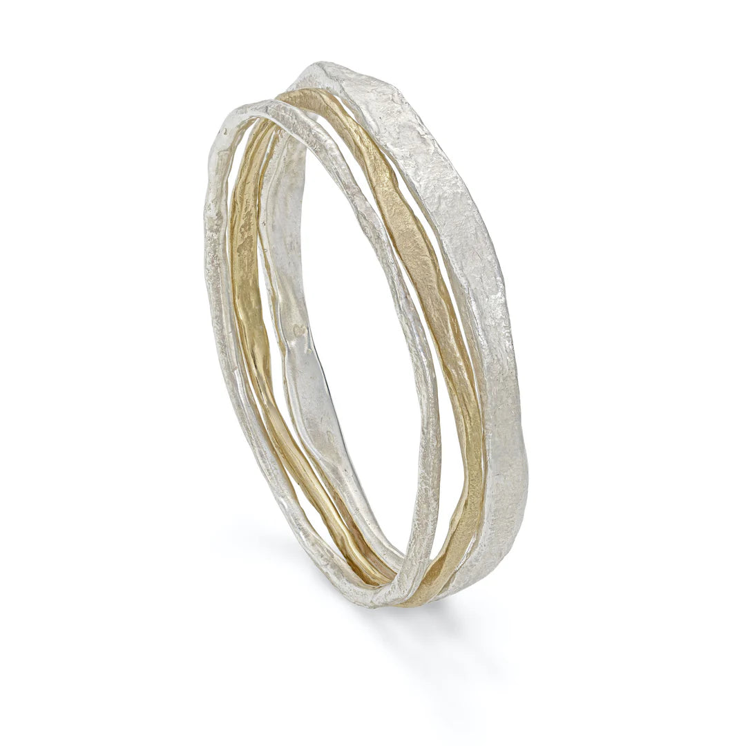 silver and gold bangle set