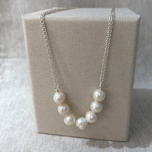 silver and pearl necklace