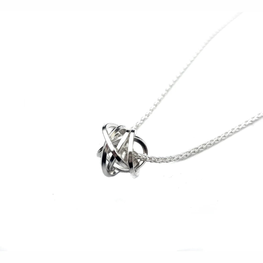 silver knot pendant on a silver chain