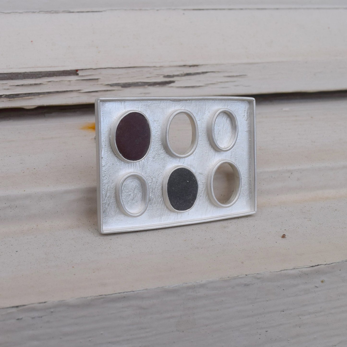 silver and pebble brooch
