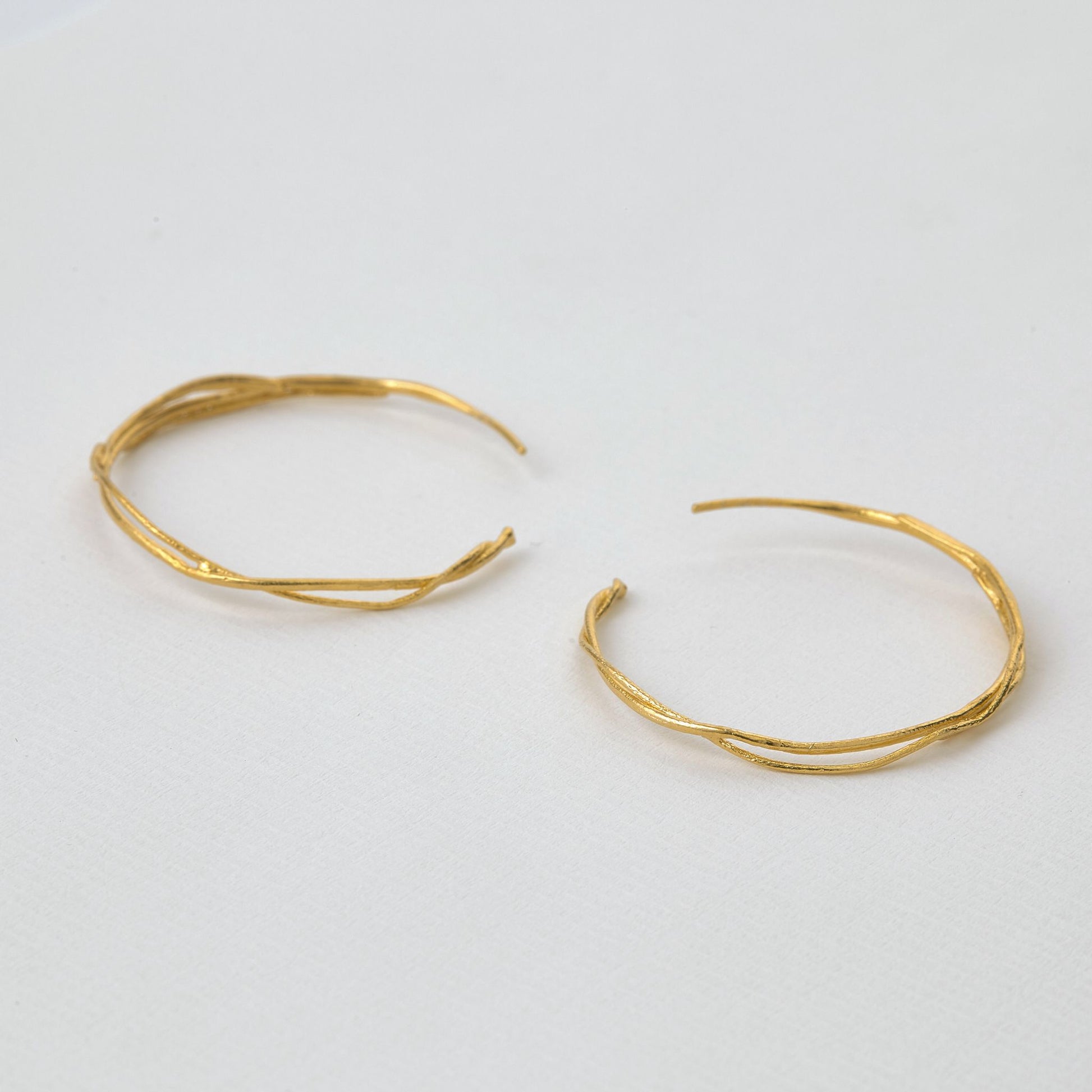 twist hoops gold