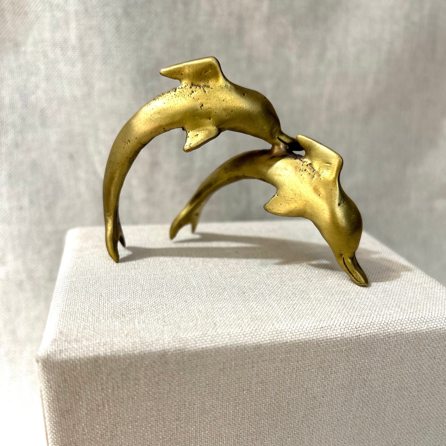 two dolphins sculpture