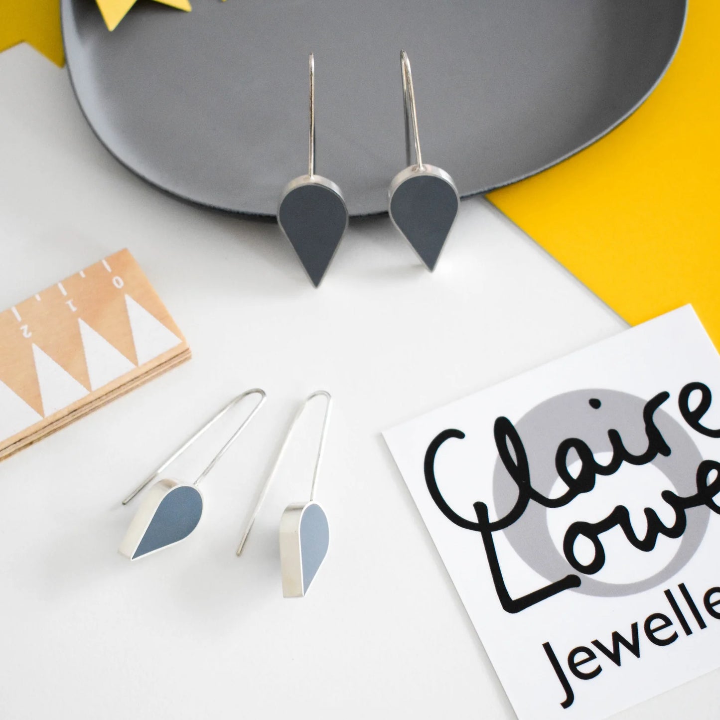 grey resin and silver earrings