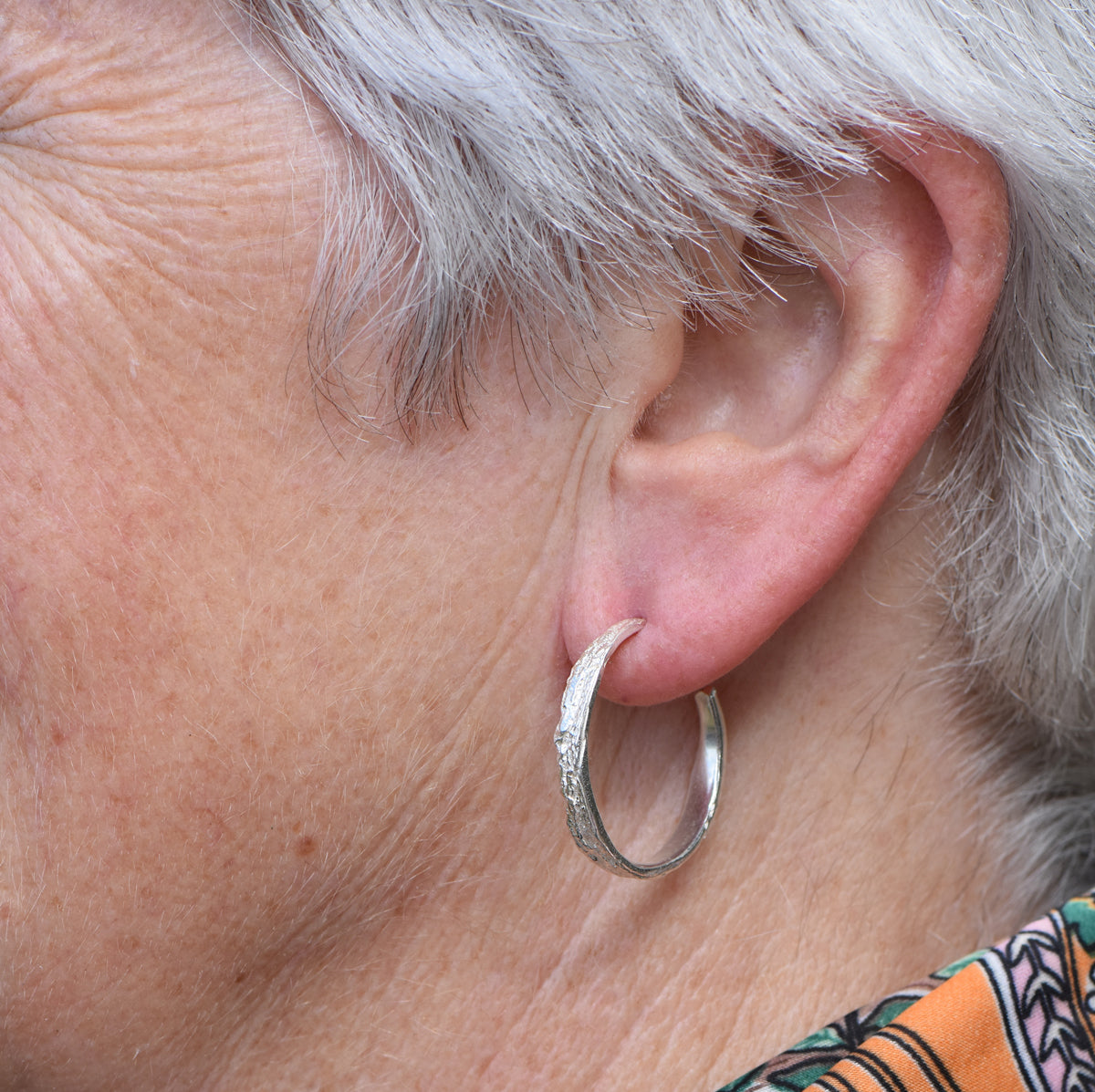 hoop earrings worn