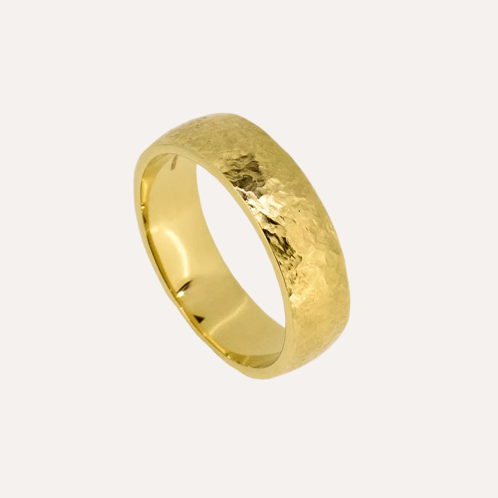 yellow gold textured wedding ring