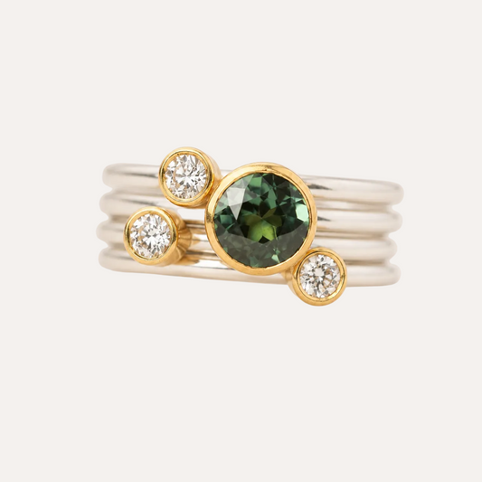 Stacking rings with diamonds and Teal Sapphire