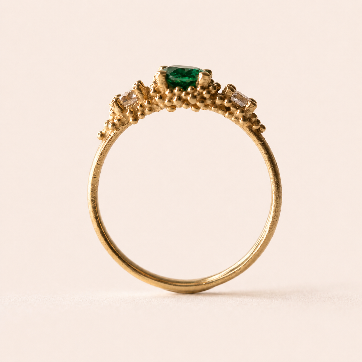Triple cluster ring with teal sapphire