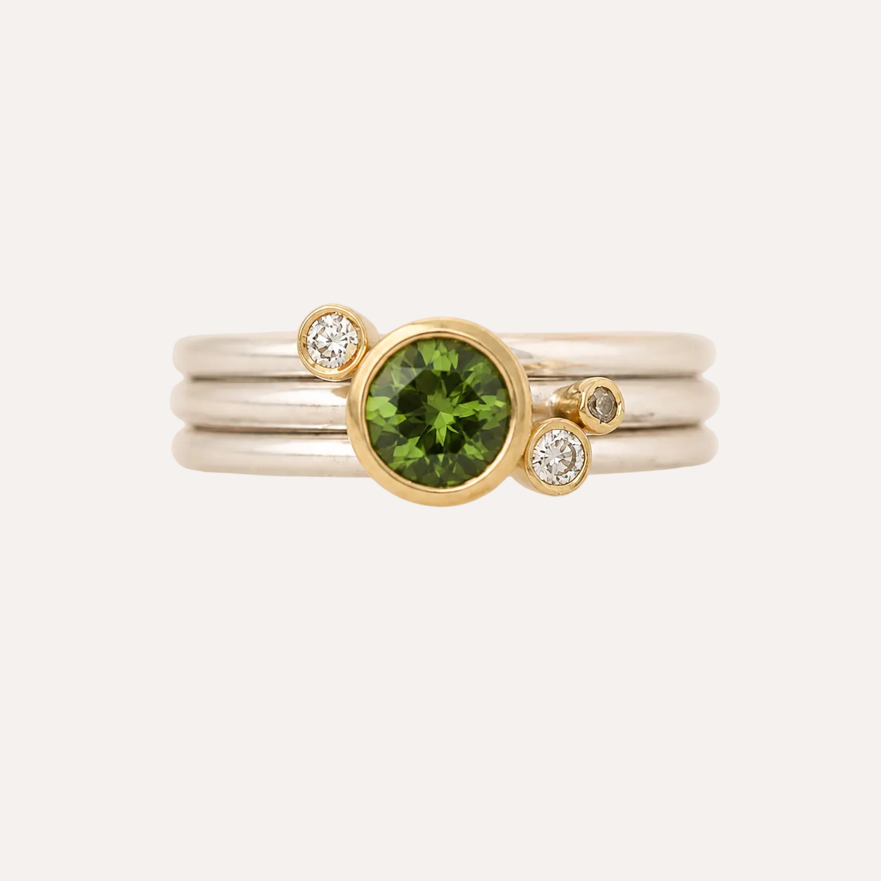 Stacking rings with diamonds and Green Sapphire