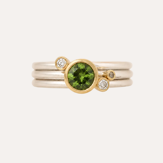 Stacking rings with diamonds and Green Sapphire