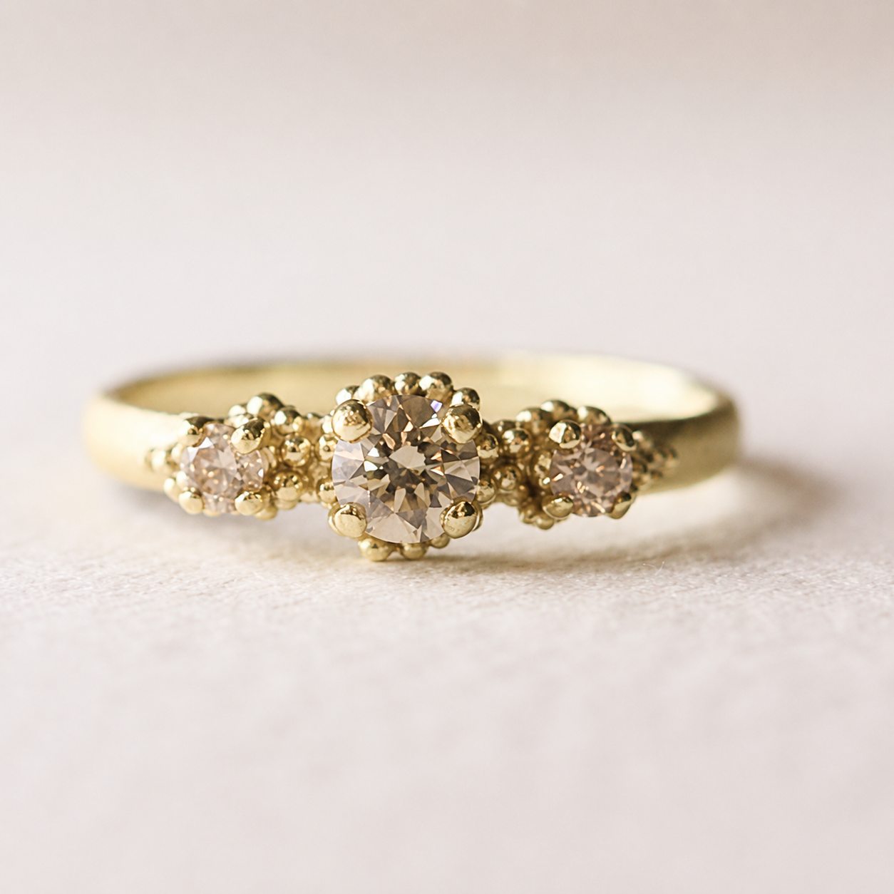 Triple Cluster Ring with Champagne Diamonds