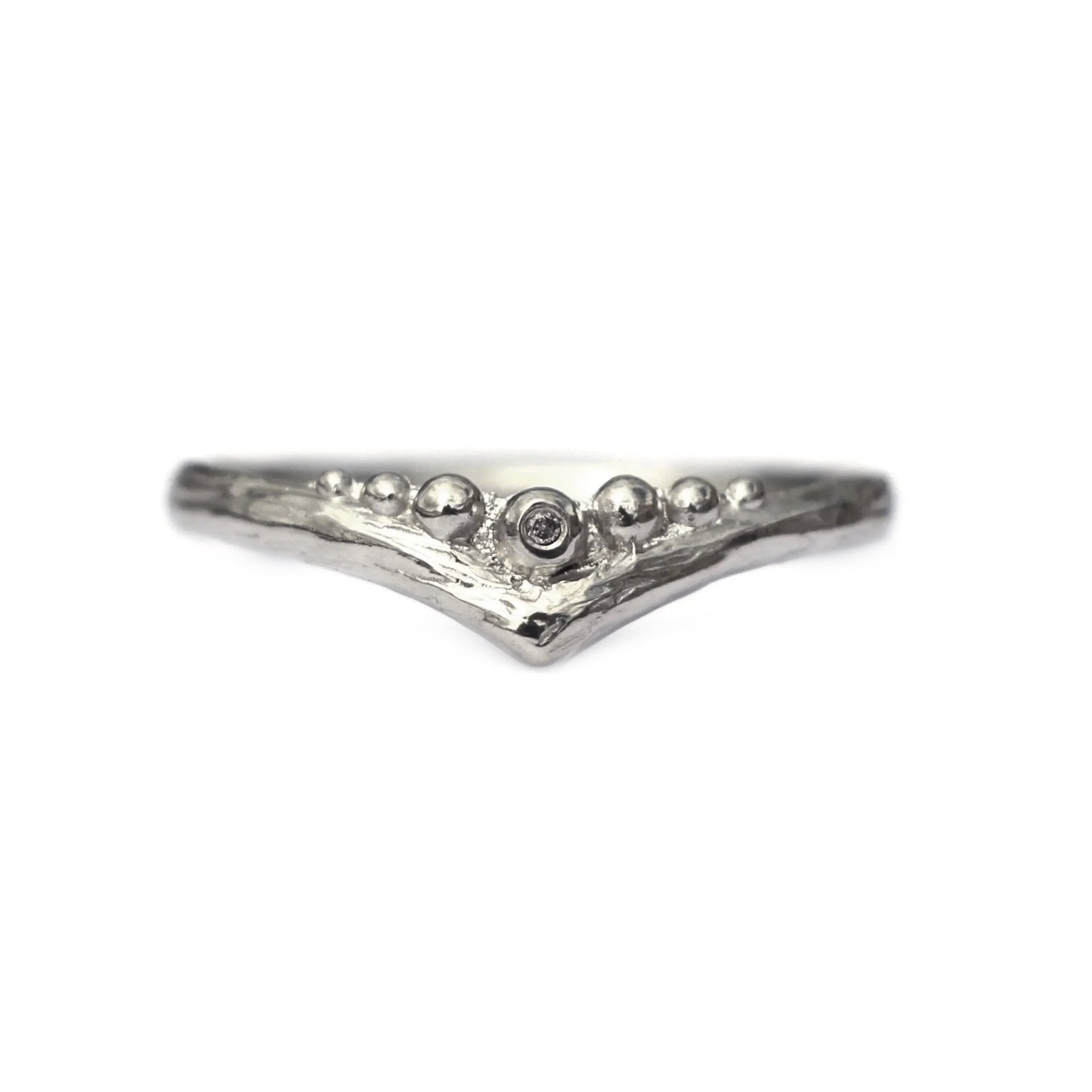 Urchin ring with tiny pink diamond platinum
