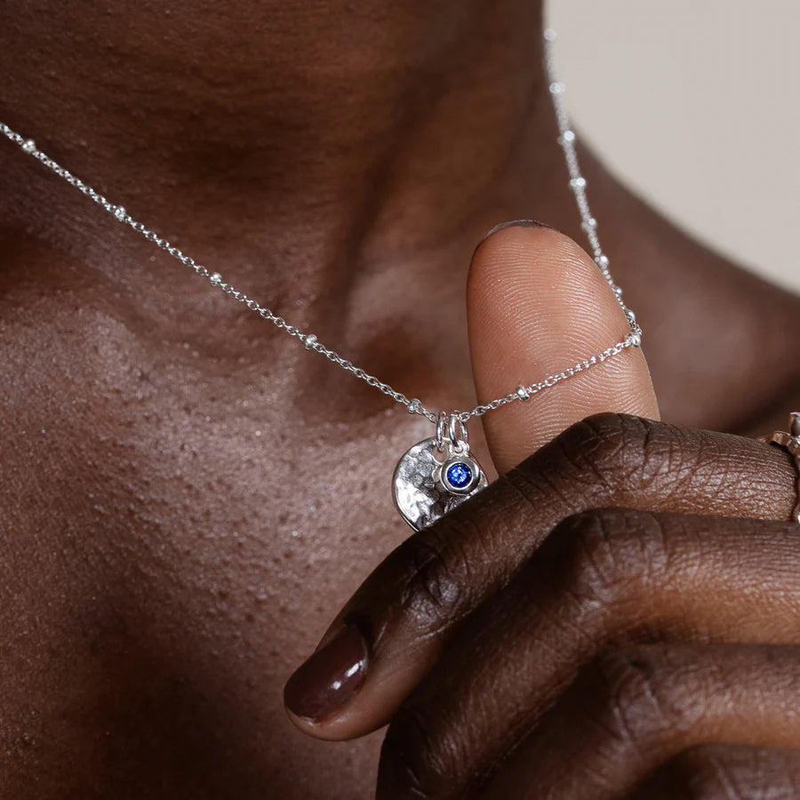 Hammered Disc and Sapphire Pendant Silver