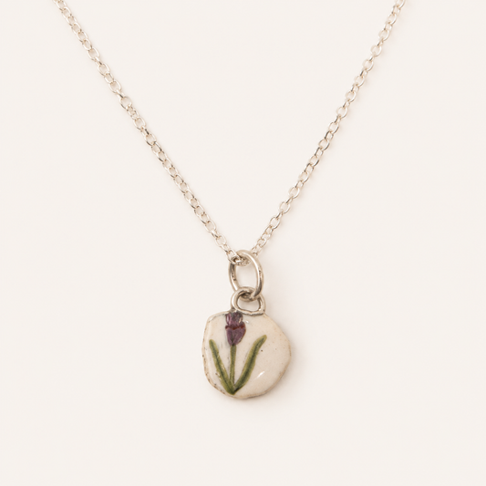 Tulip on white enamel pendant