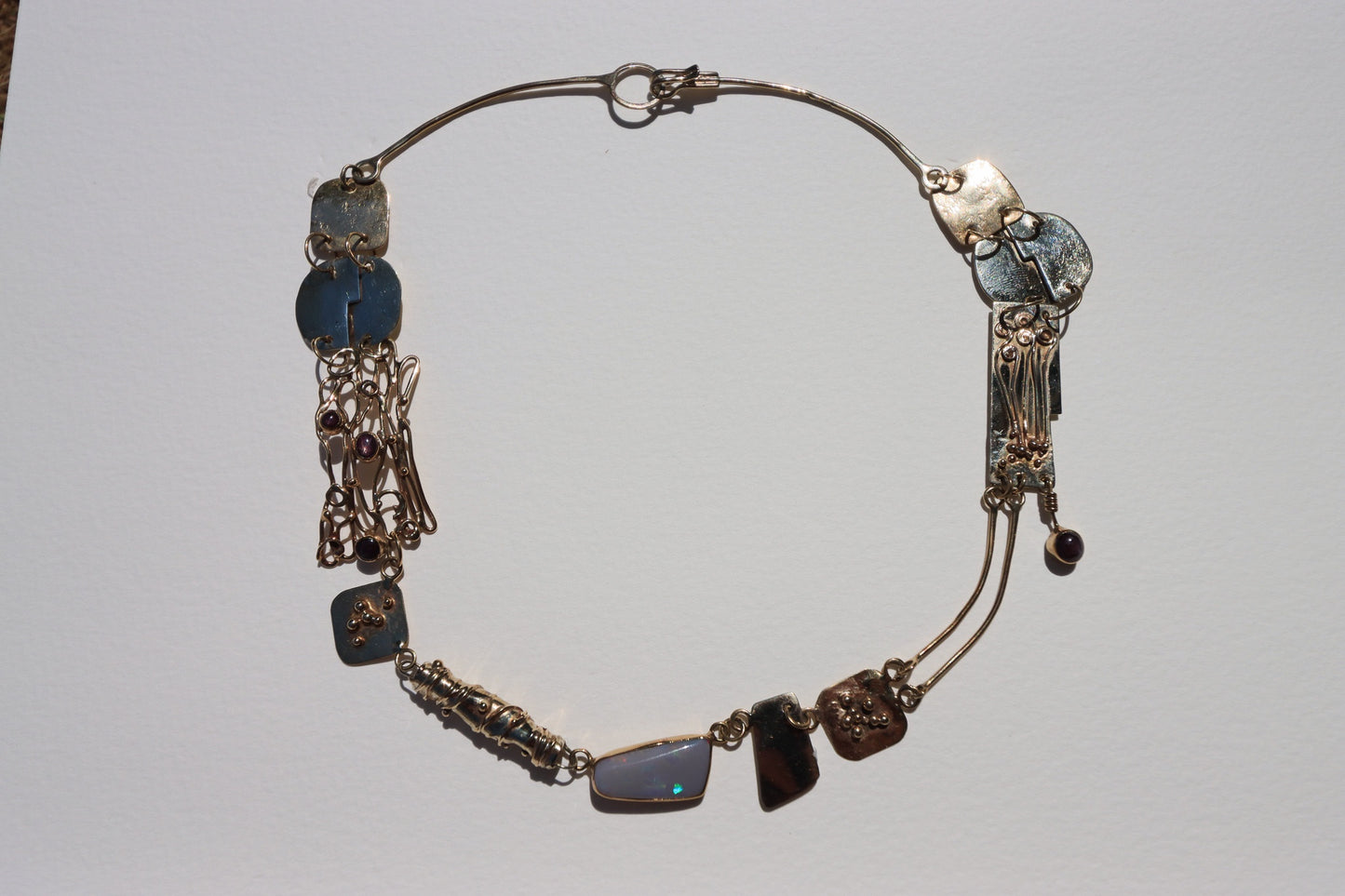 VAULT - Pam Burrows 9ct gold necklace with star sapphire & opal