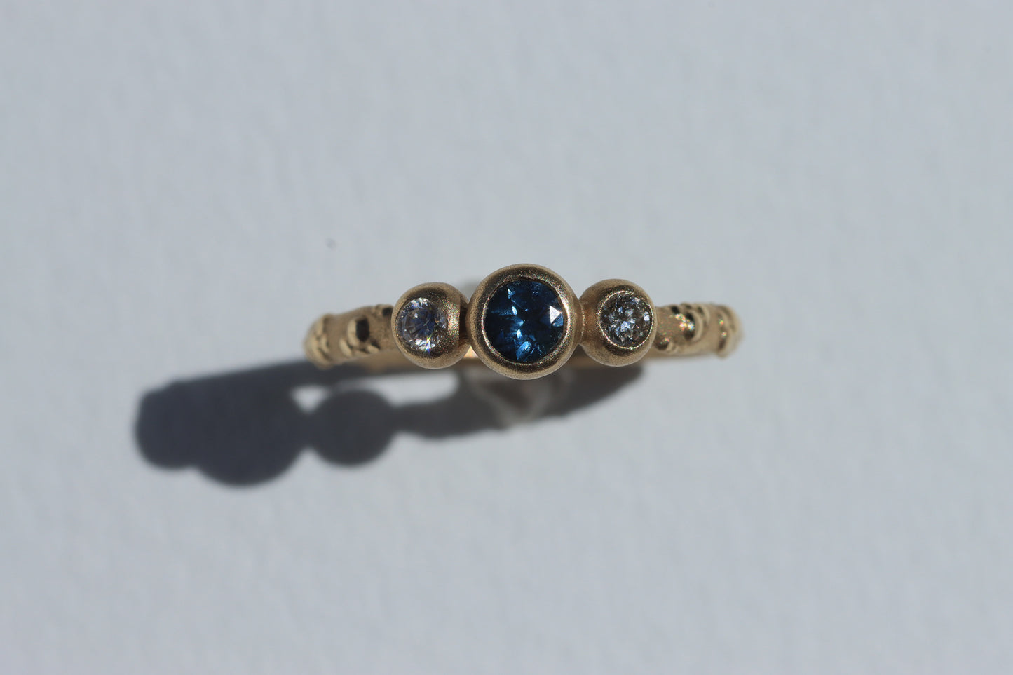 Orno 3 stone ring with blue sapphire 9ct yellow gold