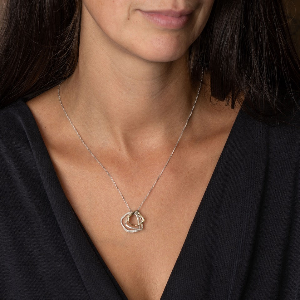 pebbles circles necklace worn