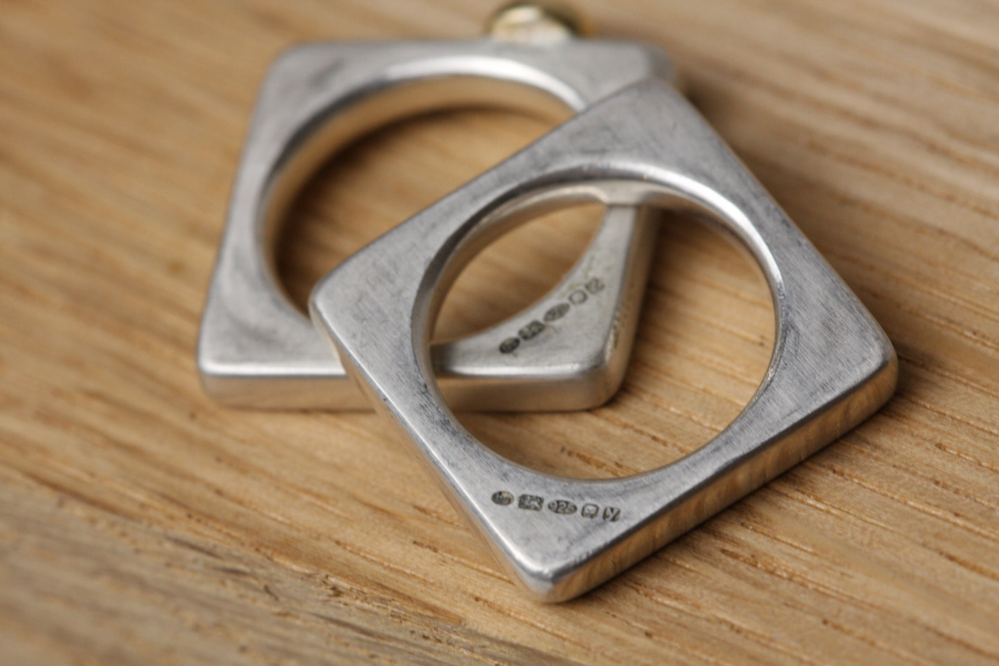 VAULT - Barbara Spence Square Silver stacking rings with gold nugget