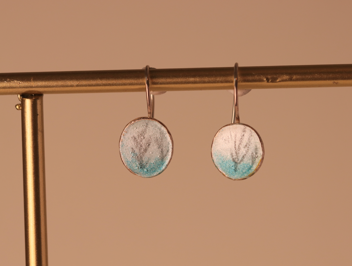 Enamelled hook oval earrings with drawn sprigs