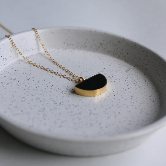 arc black pendant gold