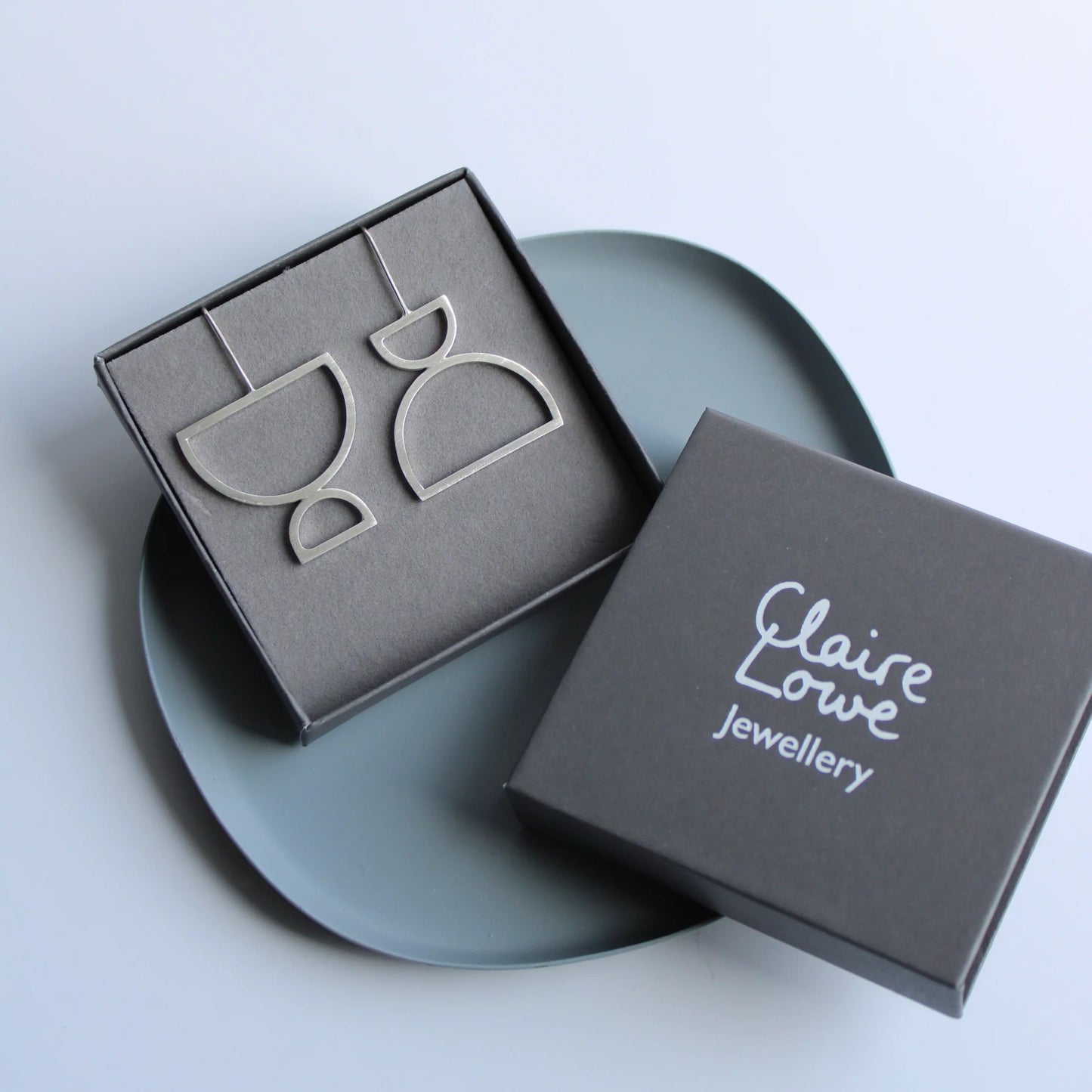 arc drop earrings