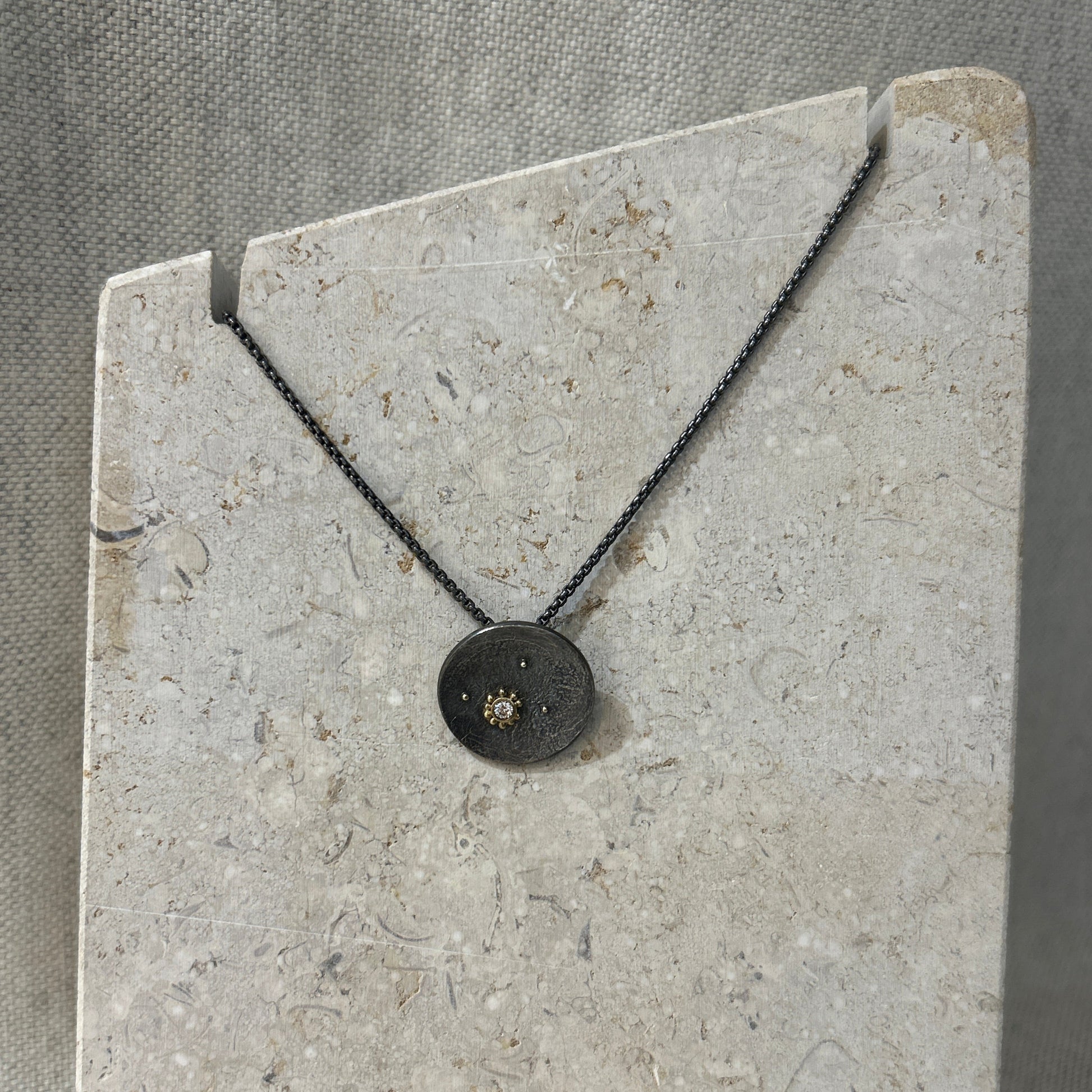 oxidised silver and diamond pendant